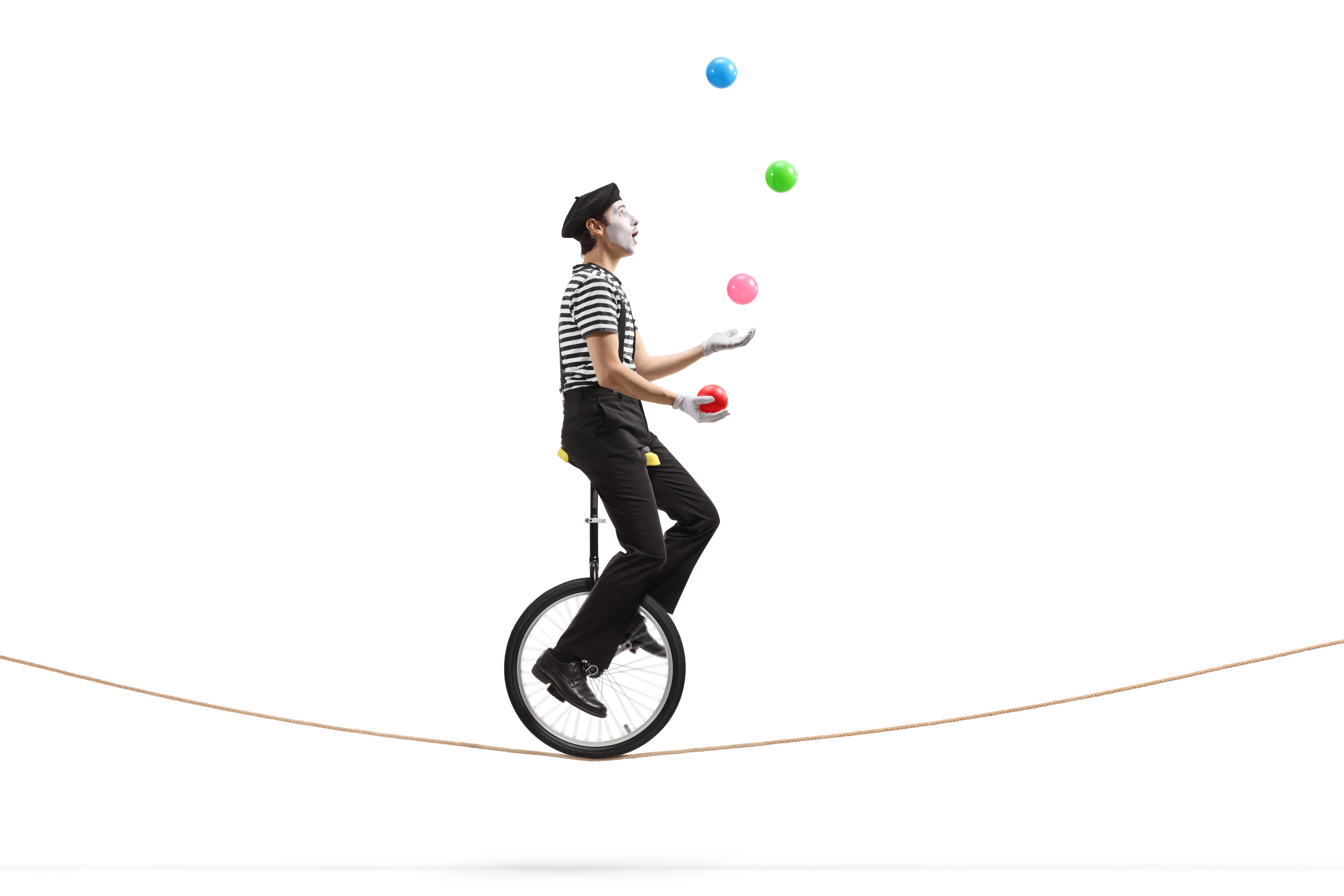 Juggler on unicycle